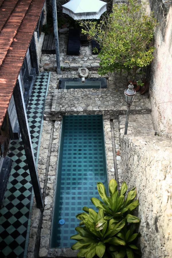 Coqui Coqui Casa De Los Santos Izamal - The Only One Suite Collection ภายนอก รูปภาพ